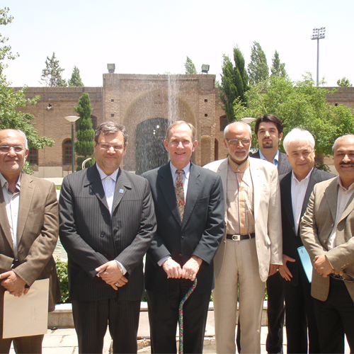 Peter Agre stands with a group of scientists and diplomats at Tehran University