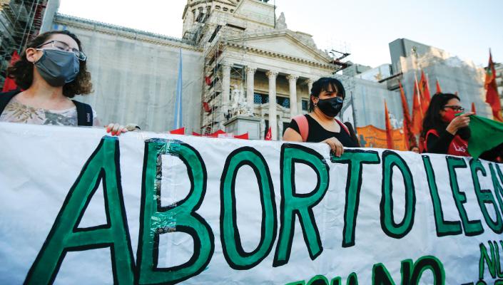 Argentine demonstrators voice support for the decriminalization of abortion outside the National Congress building on September 28, 2020, in Buenos Aires.