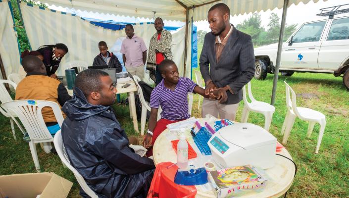 Rakai Health Sciences Program team connects with community members on September 14, 2017.