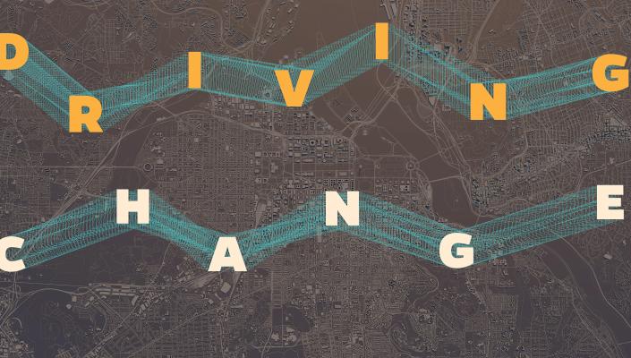 The words driving change over a transportation map.