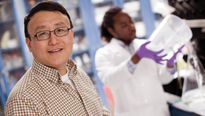 Xiao-Fang Yu in his laboratory