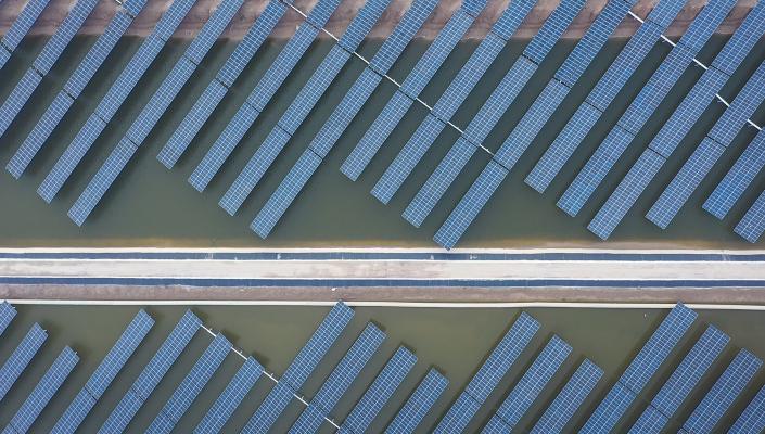 Solar panels in Dongying City, China, generate power and cool the waters of a shrimp fishery.