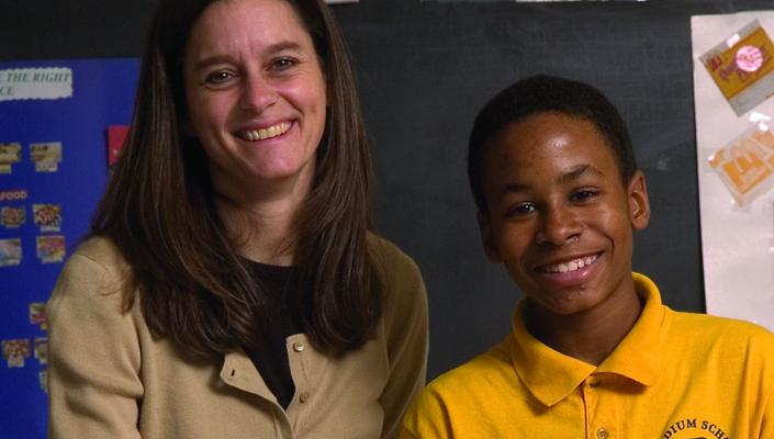 Teacher Kristina Berdan and students Ronnie Chapman and Joshuah Broadnax