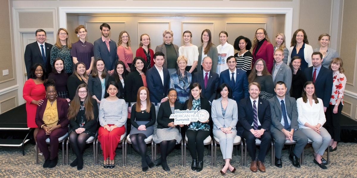 Image of BloombergFellows with Dean MacKenzie & President Daniels