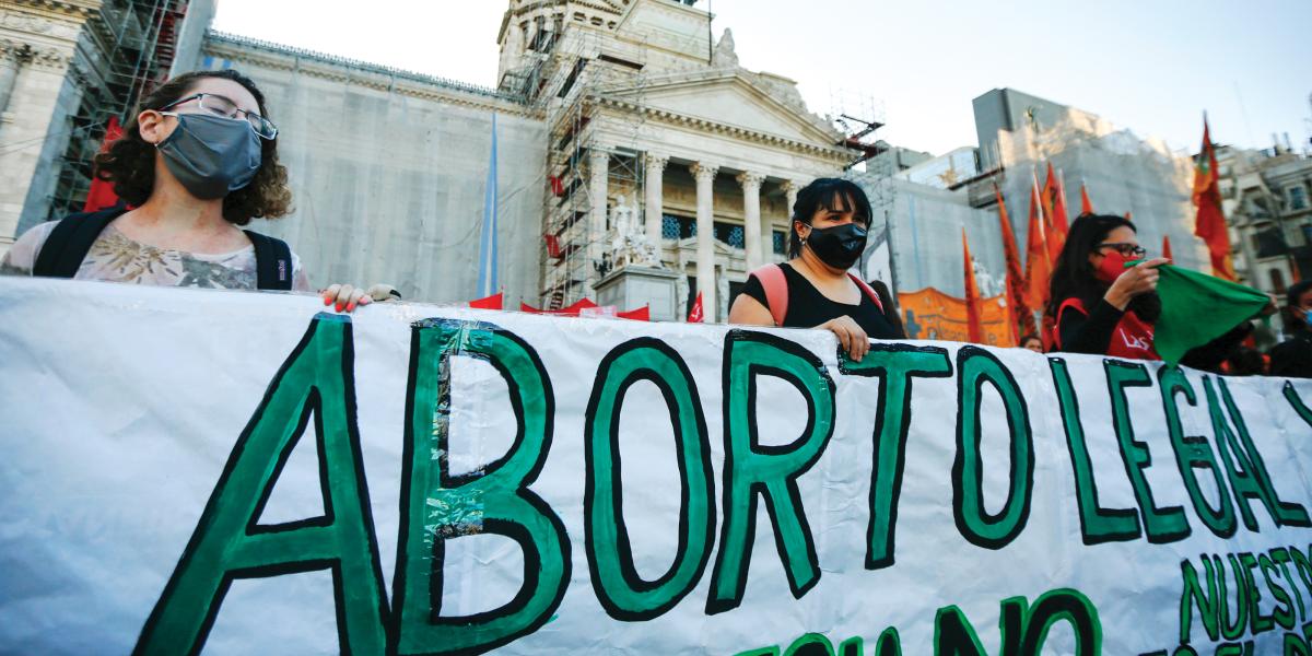 Argentine demonstrators voice support for the decriminalization of abortion outside the National Congress building on September 28, 2020, in Buenos Aires.