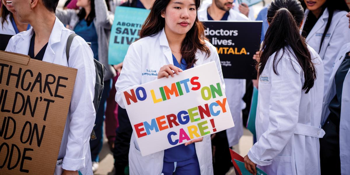 A group of doctors join abortion rights supporters at a rally outside the Supreme Court on April 24, 2024 in Washington, D.C. 