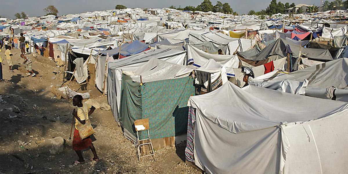 tent structures built close together stretch across the distance, filling the photo frame