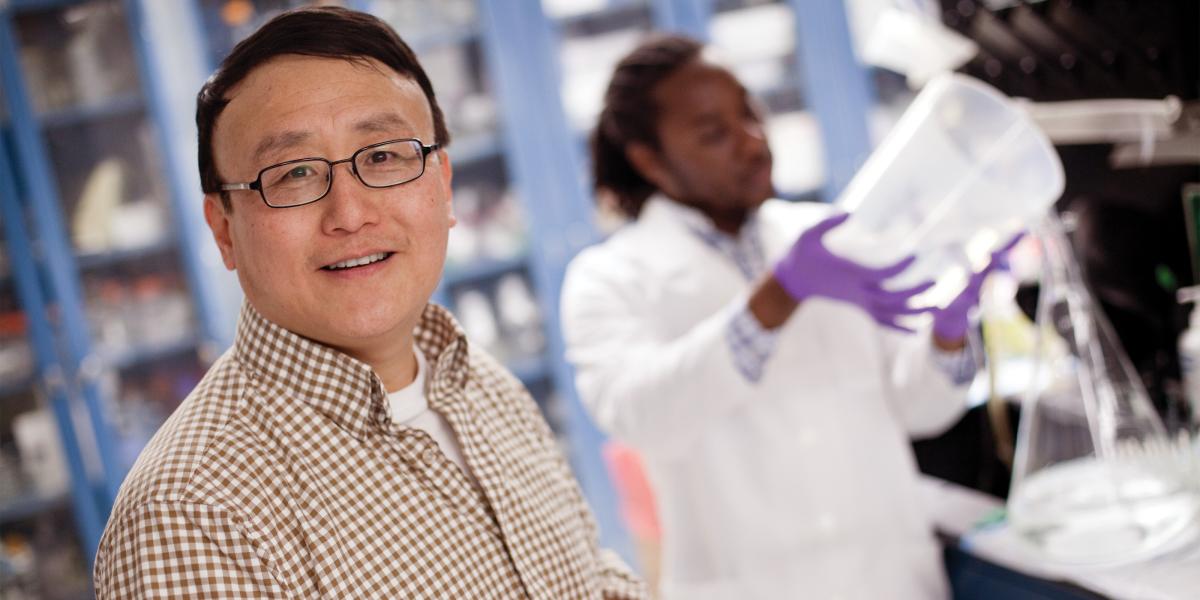 Xiao-Fang Yu in his laboratory