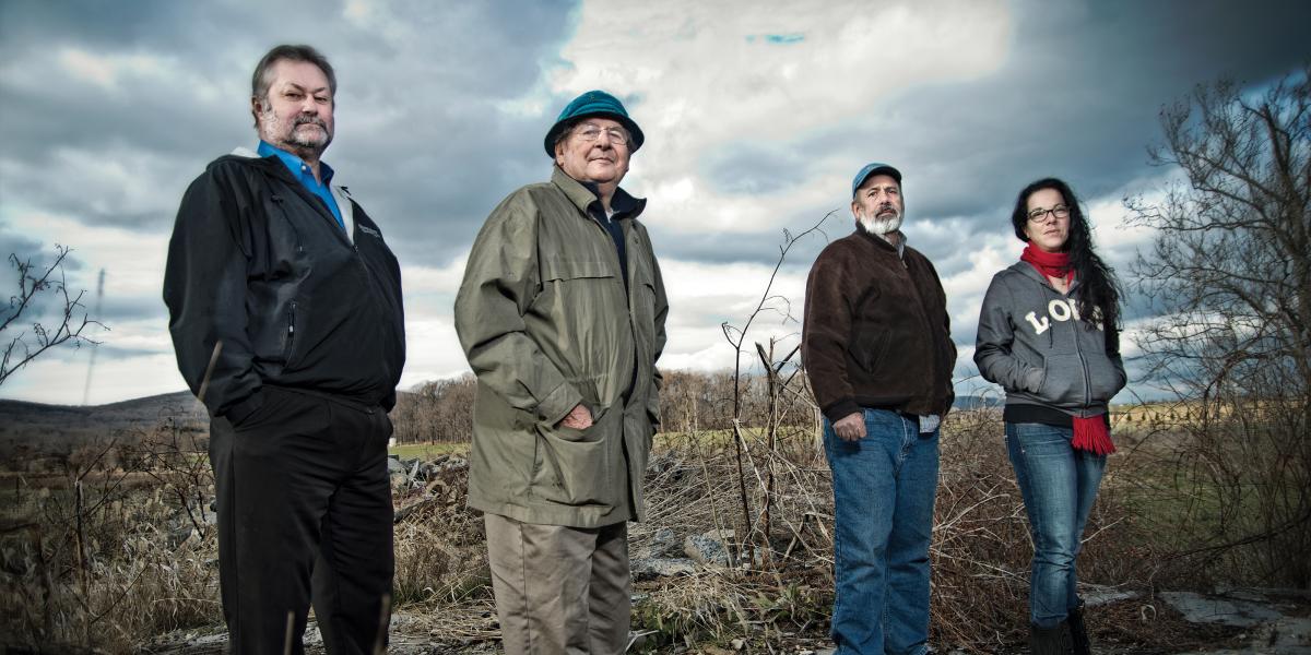 Citizens united: Bob Roberson, Bill Krantz, Jim Krantz and Jennifer Peppe Hahn gather outside Fort Detrick’s Area B in central Maryland. December 11, 2012.