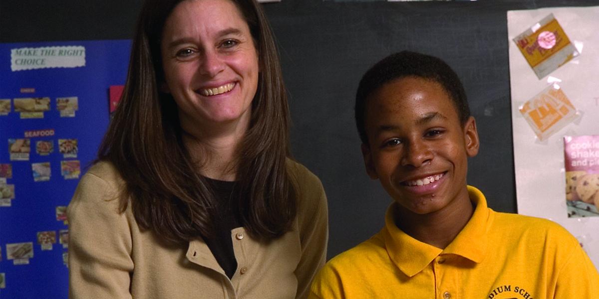 Teacher Kristina Berdan and students Ronnie Chapman and Joshuah Broadnax