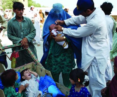 Field doctors attend to children in a crisis situation