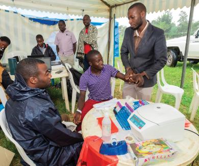 Rakai Health Sciences Program team connects with community members on September 14, 2017.