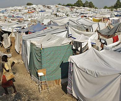 tent structures built close together stretch across the distance, filling the photo frame