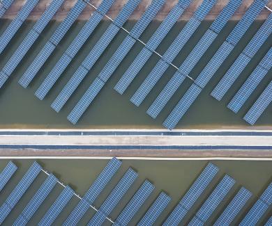 Solar panels in Dongying City, China, generate power and cool the waters of a shrimp fishery.