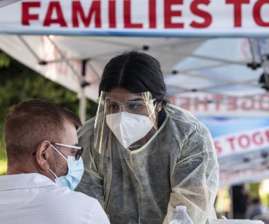 A medical assistant takes the blood pressure of a man at a monkeypox vaccination clinic at Families Together of Orange County in Tustin, CA on Tuesday, August 16, 2022. 