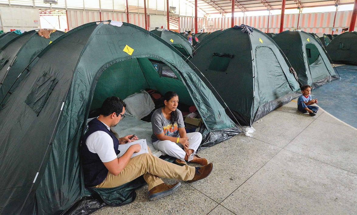 reporter interviewing migrant