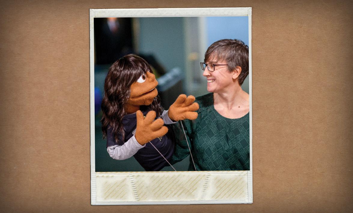 Researcher with a felt dummy